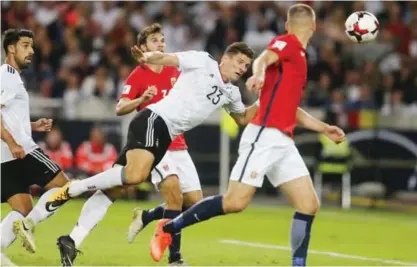  ?? — AP ?? STUTTGART: Germany’s Mario Gomez scores his side’s sixth goal during the World Cup Group C qualifying soccer match between Germany and Norway in Stuttgart, Germany, Monday.