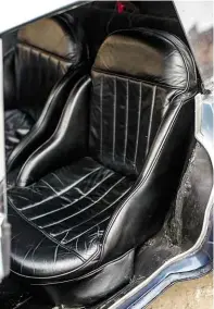  ??  ?? Above and lower facing page Bucket seats and scooped-out doors maximise the tight driving environmen­t; V12 engine was originally a 2.0-litre, replaced by the 2.5-litre engine of a 212 Inter in 1954.