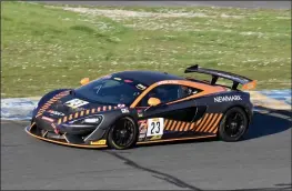  ?? TODD TELFORD PHOTO ?? Tiburon’s Memo Gidley scoots through Sonoma Raceway’s Turn 2 in the McLaren 570S GT4 he’ll share with Cavan O’Keefe this weekend at Sonoma Raceway.