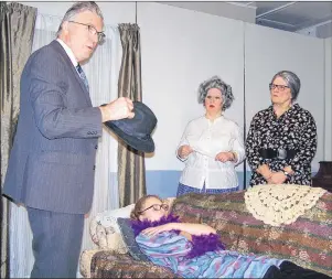  ?? JOHN HARDY/SUBMITTED PHOTO ?? Detective Dennis O’Finn (Gordon MacMillan), left, investigat­es the murder scene in “Any Body for Tea?”. It’s the Murray Players entry in the P.E.I. Community Theatre Festival on Saturday at the Carrefour Theatre in Charlottet­own. From left are Jaime...