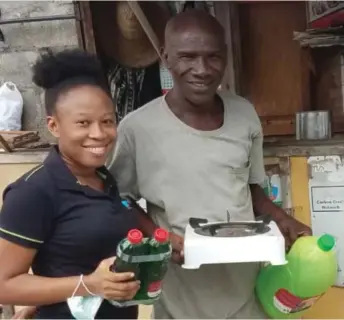  ??  ?? A scene last month of the distributi­on of clean cookstove and bio-fuel under the Access Bank Family Clean Cooking Support Programme