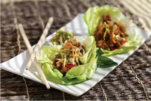  ?? Tribune News Service ?? ■ Spicy Asian Lettuce Wraps.