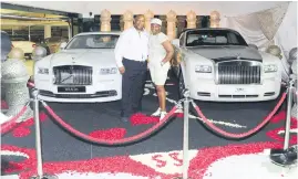  ?? Picture: Gallo Images ?? HAPPIER TIMES. Sbu Mpisane and Shauwn Mpisane – and the cars they bought each other – at their year-end party in 2013.