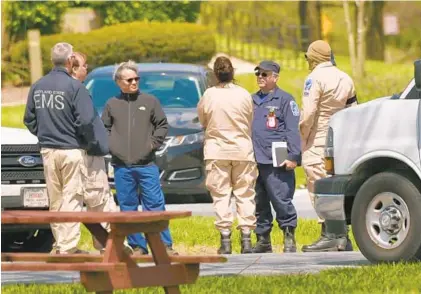  ?? JERRY JACKSON/THE BALTIMORE SUN ?? State medical officials on the scene at FutureCare Lochearn. A medical “strike team” was sent to help with the nursing home’s situation.