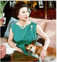  ??  ?? Queen Elizabeth
II with one of her pet corgis