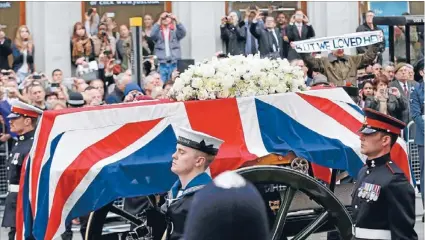  ?? Photos: REUTERS ?? Fond farewell: The coffin of former British prime minister Margaret Thatcher, draped in the Union Flag, is carried on a gun carriage drawn by the King’s Troop Royal Artillery during her funeral procession in London.