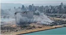  ?? AFP ?? Concrete grain silos absorbed much of the port blast that killed more than 200 people in Beirut last August