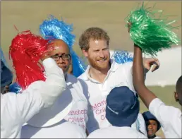  ?? PICTURES: REUTERS, EPA ?? FORGET ME NOT: Britain’s Prince Harry and Lesotho’s Prince Seeiso during a visit to the Mamohato Children’s Centre in Thaba Bosiu, Lesotho, this week. Prince Harry is in the country on behalf of Sentebale, the charity he founded with Prince Seeiso, in...