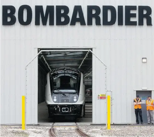  ?? SIMON DAWSON / BLOOMBERG FILES ?? An Aventra Class 345 electric test train sits in a hangar at the Bombardier rail vehicles production site in Derby, U.K. On Thursday, Bombardier named Danny Di Perna as head of the company’s troubled train unit.