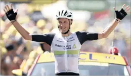  ??  ?? WHAT A WIN: Britain’s Stephen Cummings, riding in the colours of South African team Dimension Data, celebrates victory on the 162.5km seventh stage from L’Isle-Jourdain to Lac de Payolle of the Tour de France yesterday.