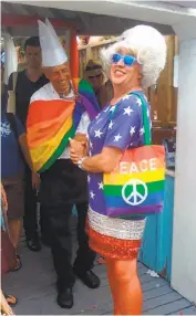  ??  ?? Gilbert Baker, above, in his American flag dress. Left: Baker in rather subdued stars and stripes at the 1984 Democratic Convention.