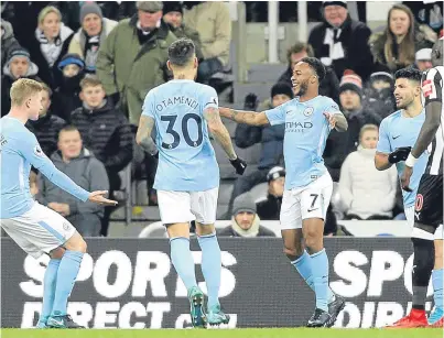  ?? Picture: PA. ?? Raheem Sterling (No 7) celebrates his goal against Newcastle United.