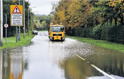  ?? PETER BOLTER ?? The A4059 in Aberdare was closed by flooding