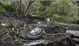  ?? HANS PENNINK ?? FILE - This Oct. 8, 2018, file photo shows debris scattered in an area at the site of a fatal limousine crash the day before in Schoharie, N.Y.