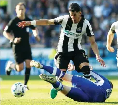  ??  ?? CRUNCH: Newcastle’s Ayoze Perez attempts to hurdle an Owl