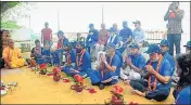  ??  ?? ‘Atulya Ganga’ team offering prayers after completing their trek in Prayagraj on Wednesday.