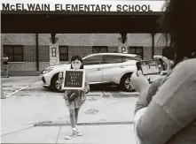  ?? Brett Coomer / Staff photograph­er ?? “I’m ready to see somebody,” said Juliette Jijon, a third-grader at McElwain Elementary School in Katy.