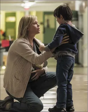  ??  ?? Charlize Theron as Marlo and Asher Miles Fallica as Jonah in Tully.