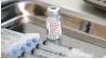  ?? AFP-Yonhap ?? A vial of the Moderna COVID-19 vaccine and syringes sit prepared at a pop-up vaccine clinic at the Jewish Community Center of Staten Island, New York City, April 16.