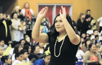  ?? PHOTOS: HAMISH MACLEAN ?? Celebratio­n . . . Year 11 Waitaki Girls’ High School pupil Sinamoni Sikei, of Oamaru, performs at the North Otago Schools Fiefia Evening at the Waitaki Community Recreation Centre on Thursday.