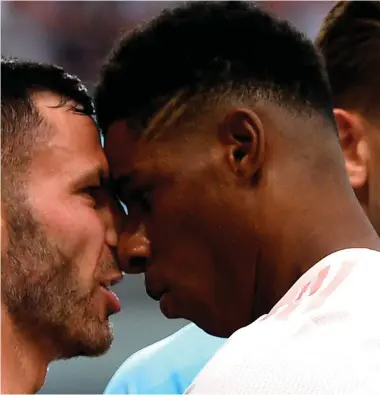  ?? GETTY IMAGES ?? Phil Bardsley and Marcus Rashford go head-to-head at Turf Moor in the incident that resulted in the Manchester United striker being sent off