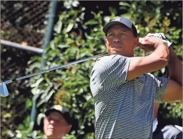  ?? / AP - Marco Ugarte ?? Tiger Woods is already drawing crowds as he prepares to play in the Mexico Championsh­ip, his first time playing a tournament in the country.