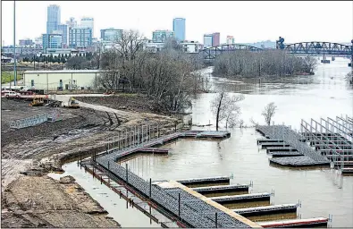  ?? Arkansas Democrat-Gazette/MITCHELL PE MASILUN ?? The bank of the Arkansas River in downtown Little Rock, photograph­ed Thursday, is the future home of Rock City Yacht Club. The project has been years in the making.