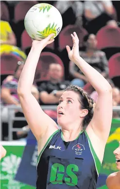  ??  ?? High point: Kyla Bowman shoots for goal in Northern Ireland’s comprehens­ive defeat against the classy Australian Diamonds