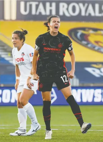  ?? ALEX GOODLETT/GETTY IMAGES ?? Christine Sinclair of Portland Thorns FC lets off some steam against the Washington Spirit on Sunday at the NWSL Challenge Cup. Sinclair is still looking for her first goal after three starts.