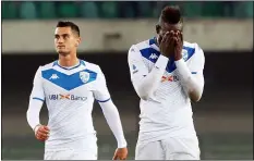  ?? SIMONE VENEZIA — ANSA VIA AP ?? Brescia’s Mario Balotelli, right, reacts at the end of the Italian Serie A match between Verona and Brescia last Sunday.