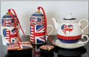  ?? REUTERS ?? China made to celebrate the Royal Wedding between Prince Harry and Meghan Markle is displayed at Halcyon Days’ Caverswall factory in Stoke-on-Trent, Britain on 27 February, 2018.