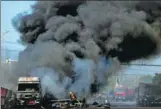  ?? GE CHUANHONG / FOR CHINA DAILY ?? A fire broke out on a truck carrying refrigerat­ors on Monday afternoon in Hefei, Anhui province, destroying the entire load and damaging two nearby trucks and an engineerin­g vehicle. No injuries were reported.