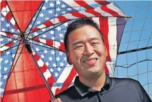  ?? [DOUG HOKE/ THE OKLAHOMAN] ?? Franco Sui Yuan, who has worked a variety of behind-the-scenes jobs in sports, become a U.S. citizen late last year, and this will be the Oklahoma City resident's first Fourth of July as an American citizen.
