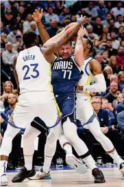  ?? Tim Heitman/getty Images ?? The league didn’t think Luka Doncic (77) was on the money with a sign he made toward officials.