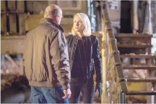  ?? COURTESY OF ALISON COHEN ROSA/FOCUS FEATURES ?? Dean Norris and Naomi Watts in a scene from “The Book of Henry.”