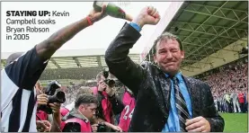  ?? ?? STAYING UP: Kevin Campbell soaks Bryan Robson in 2005