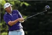  ?? Gregory Shamus / Getty Images ?? Ryan Palmer plays a shot during the third round of the Sentry Tournament Of Champions.