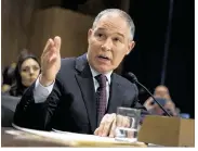  ?? J. SCOTT APPLEWHITE / AP ?? Oklahoma Attorney General Scott Pruitt testifies on Capitol Hill at his confirmati­on hearing as Environmen­tal Protection Agency administra­tor last month. Pruitt won Senate confirmati­on Friday to head the EPA, which he had repeatedly sued to rein in its...