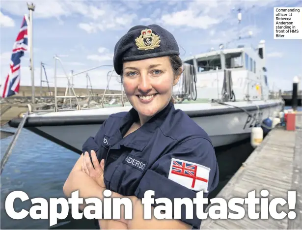  ??  ?? Commanding
officer Lt Rebecca
Anderson standing in front of HMS Biter