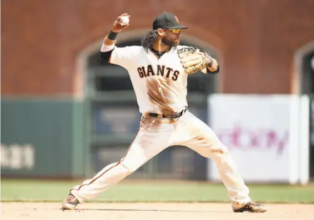  ?? Ezra Shaw / Getty Images 2018 ?? Brandon Crawford said the infield was in terrible shape after the Giants’ ballpark hosted the Rugby World Cup Sevens.