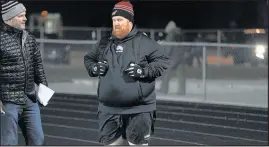  ?? JOE RAYMOND/POST-TRIBUNE ?? Lowell Kilmer stands on the sidelines in a game against Fort Wayne Dwenger on Nov. 17, 2017.