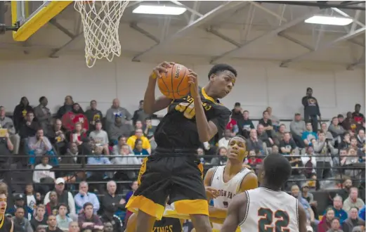  ?? WORSOM ROBINSON/FOR THE SUN-TIMES ?? Budding star Jeremiah Williams (30) has helped St. Laurence start 8-1. The Vikings could challenge Morgan Park and Bogan in Class 3A.