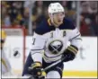  ?? MICHAEL DWYER - THE ASSOCIATED PRESS ?? FILE - In this Feb. 10, 2018, file photo, Buffalo Sabres’ Kyle Okposo (21) plays against the Boston Bruins during the second period of an NHL hockey game in Boston.