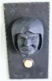  ??  ?? The front door bell features a grim-faced man in a hood, made by Glassworks and copied from an original in the Arts and Crafts style.