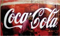  ?? DAVID GOLDMAN/THE ASSOCIATED PRESS ?? Coca-Cola currently has about 130,600 employees around the world.