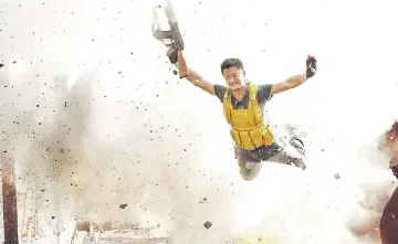  ??  ?? Wu Jing goes airborne in ‘Wolf Warrior 2’. In China, the movie is currently top-ranked in terms of box-office takings.