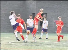  ?? PAUL DICICCO — FOR THE NEWS-HERALD ?? Mentor and Avon players vie for the ball during their Sept. 9, 2019, match at Mentor.