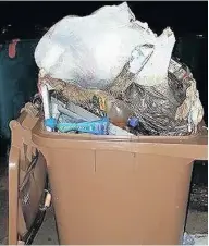  ??  ?? Rubbish Bins have been left on pavements for days, even weeks