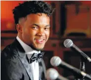  ?? AP PHOTO/LM OTERO ?? Heisman Trophy-winning quarterbac­k Kyler Murray smiles during the Davey O’Brien Award news conference Monday in Fort Worth, Texas. Murray accepted the award in his first public appearance since he announced his plan to pursue an NFL career rather than report to spring training as a firstround pick of the Oakland A’s.