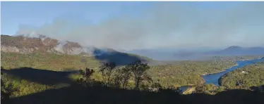  ??  ?? LAKE LURE: In this Wednesday, Nov 9, 2016 photo, a wildfire burns near Lake Lure, N.C. — AP